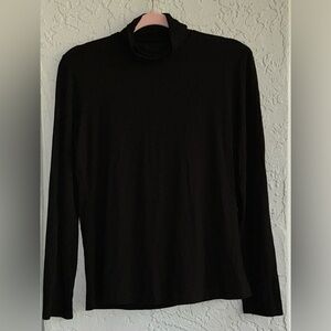 Herou Black Turtleneck Sweater